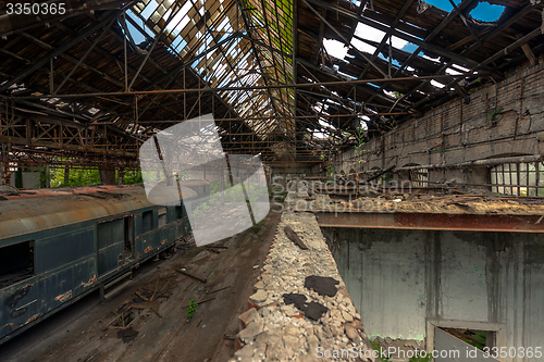 Image of Cargo trains in old train depot