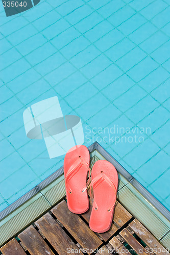 Image of Flip Flops by the Pool