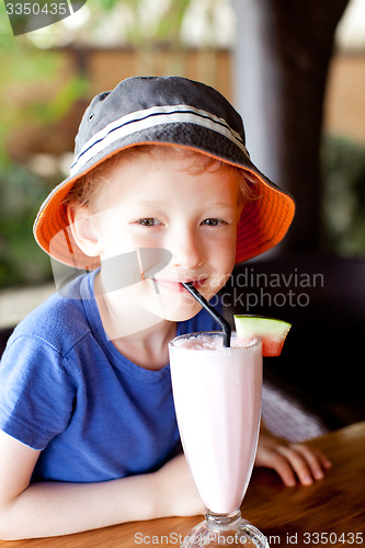 Image of kid drinking cocktail