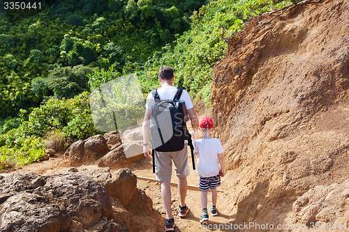 Image of family hiking