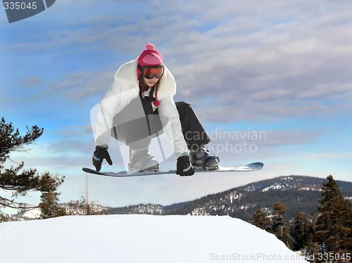 Image of Girl snowboarding