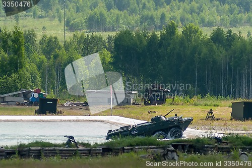 Image of BTR-82A armoured personnel carrier exit from water