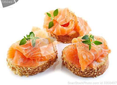 Image of baguette slices with fresh salmon