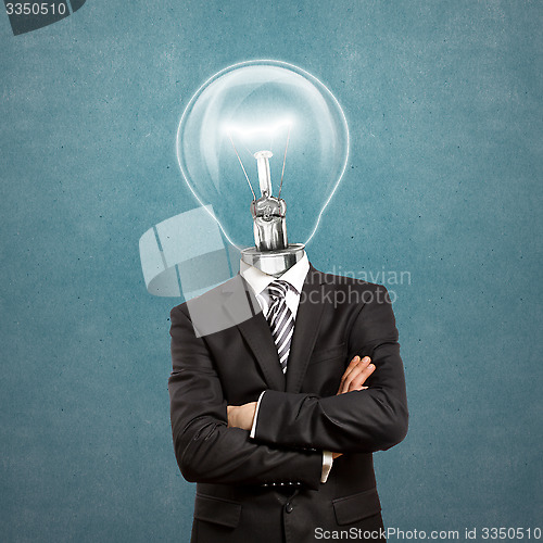 Image of Lamp Head Man In Suit With Crossed Hands