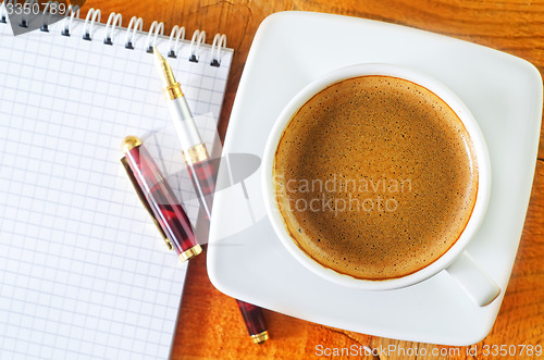 Image of coffee and note