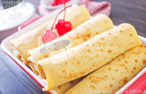 Image of pancakes with cherry