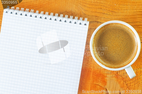 Image of coffee and note