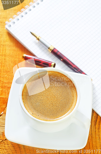 Image of coffee and note