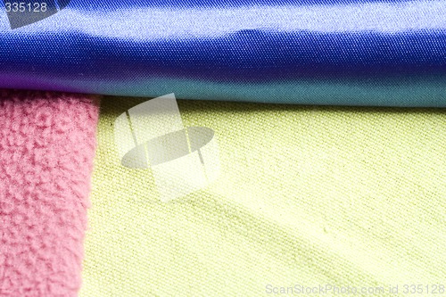 Image of Yellow, pink and blue blanket