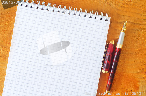 Image of coffee and note
