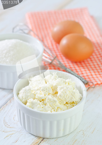 Image of cottage, sugar,and eggs