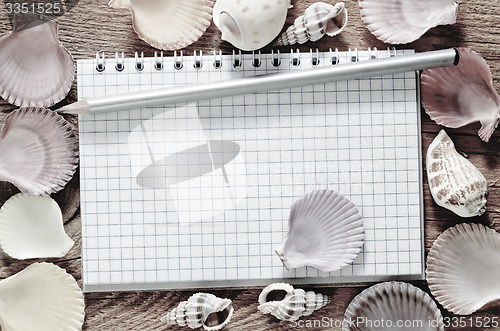 Image of shells and note