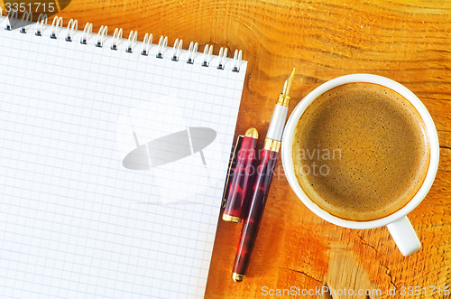 Image of coffee and note