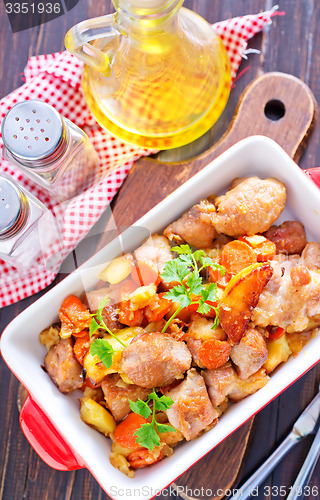 Image of fried meat with vegetables