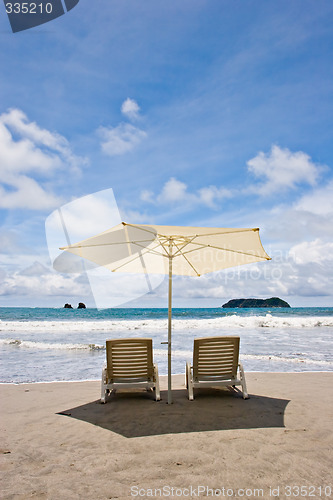 Image of Two Chairs at the Beach