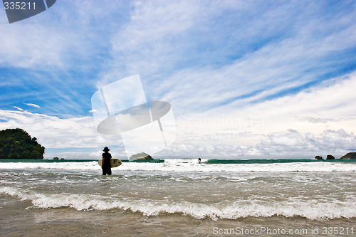 Image of Surfers at the Beach