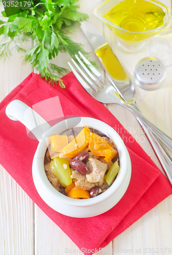 Image of baked meat with vegetables