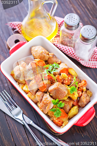 Image of fried meat with vegetables