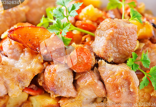 Image of fried meat with vegetables