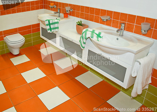 Image of Orange faucets