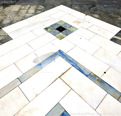 Image of busto arsizio  street  of a curch and  sanpietrini marble