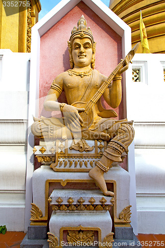 Image of siddharta   in the temple bangkok asia  mandolin