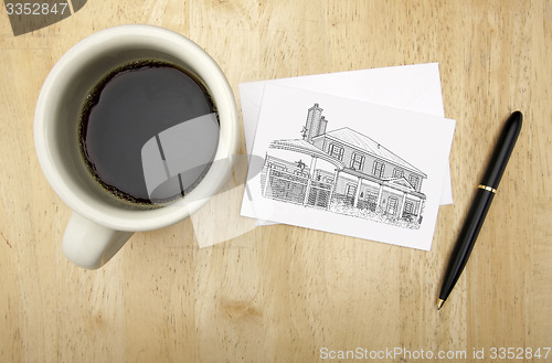 Image of Note Card with House Drawing, Pen and Coffee