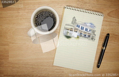 Image of Pad of Paper with House Drawing, Pen and Coffee