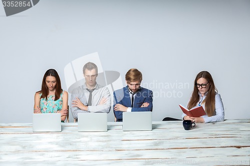 Image of Business team working on their business project together at office