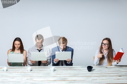 Image of Business team working on their business project together at office