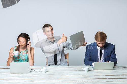 Image of Business team working on their business project together at office