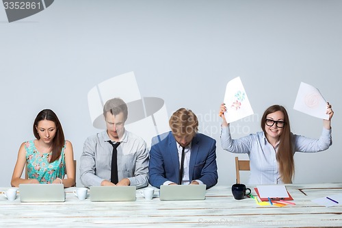 Image of Business team working on their business project together at office