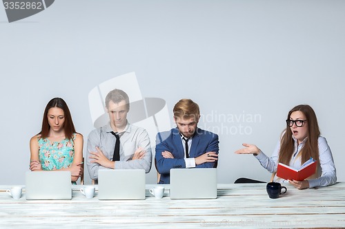 Image of Business team working on their business project together at office