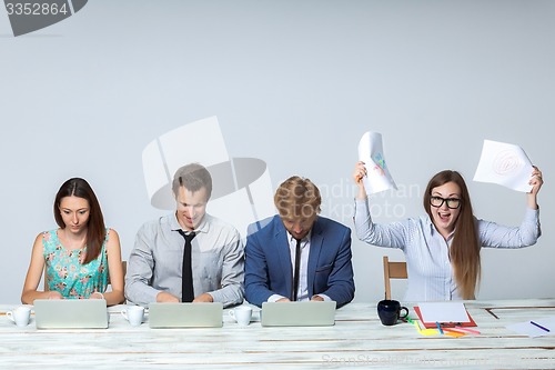 Image of Business team working on their business project together at office