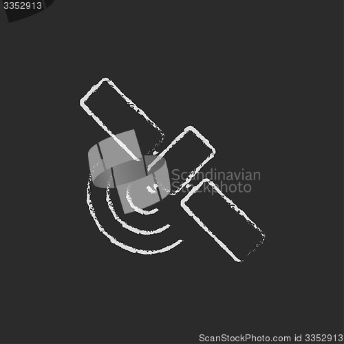 Image of Space station drawn in chalk
