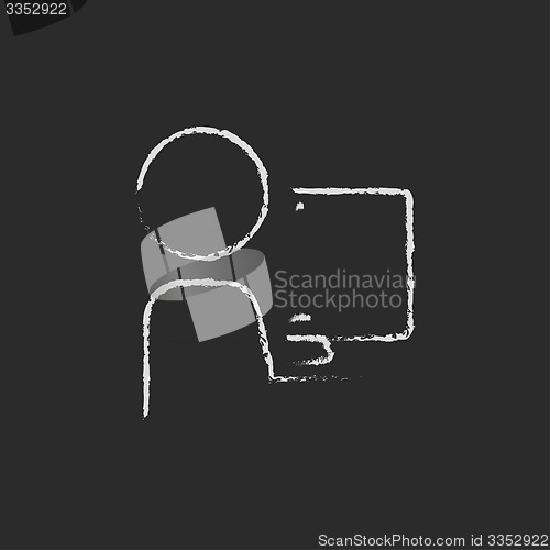 Image of Man working on computer drawn in chalk
