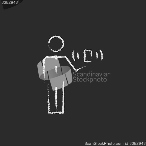 Image of Man and wireless signal drawn in chalk