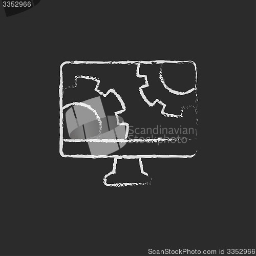Image of Computer and gear drawn in chalk