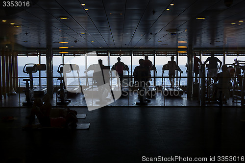 Image of People exercising at the gym