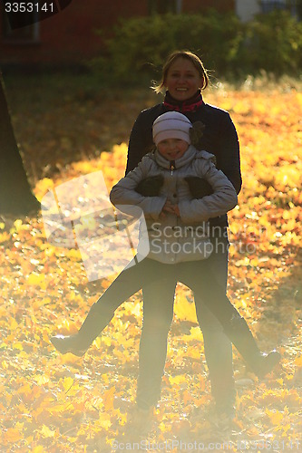 Image of woman with her daughter in the park