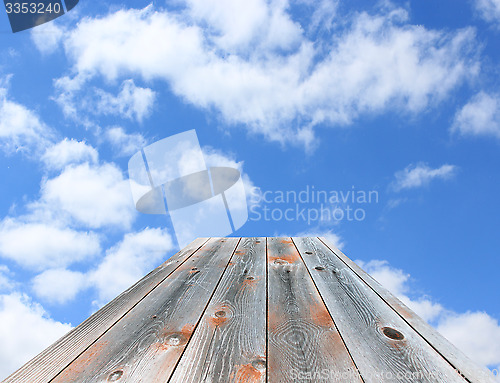 Image of road going away to sky with white clouds