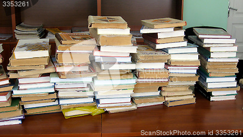 Image of heap of books in the library