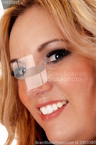 Image of Smiling pretty blond woman.