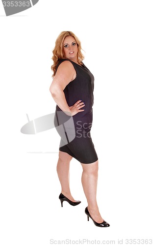 Image of Full length picture of woman in gray dress.
