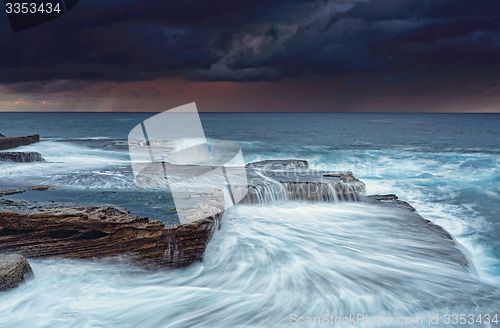 Image of Stormy skies at sunrise