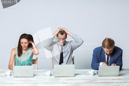 Image of Business team working on their business project together at office