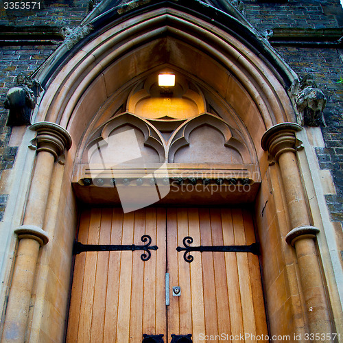 Image of wooden parliament in london old church door and marble antique  