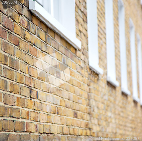 Image of old window in europe london  red brick wall and      historical 