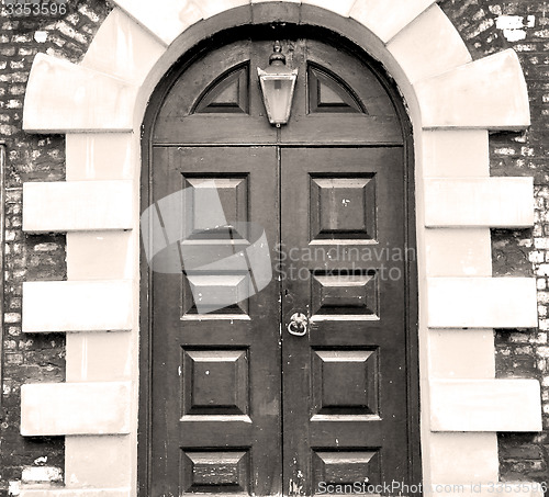 Image of wooden parliament in london old church door and marble antique  