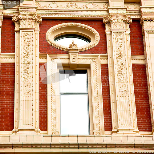 Image of old window in europe london  red brick wall and      historical 
